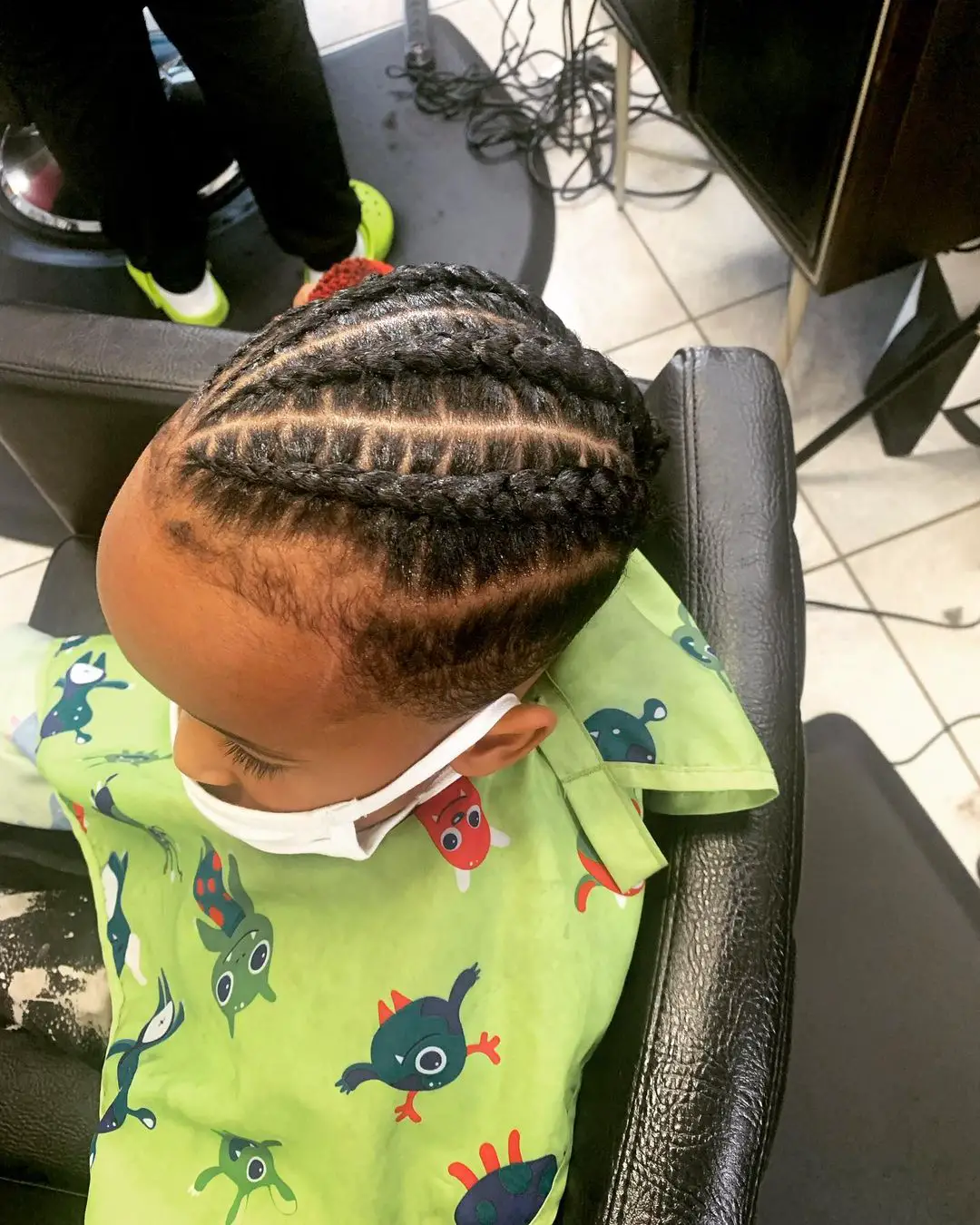 31-cute-braid-hairstyles-for-toddlers-andamp-little-boys Classic Cornrows with Fade and Bun