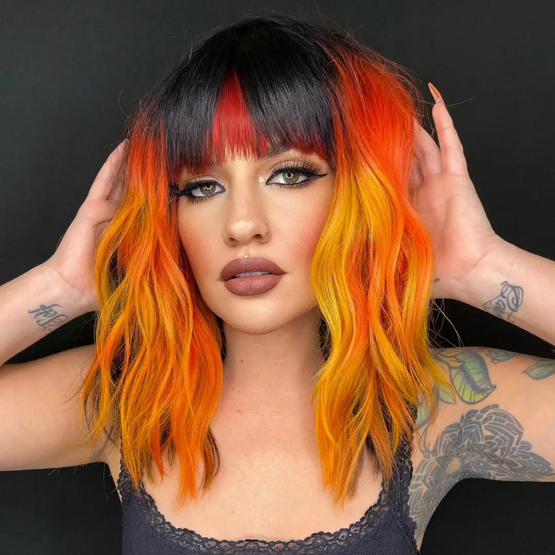 31-best-multicolored-hair-ideas-trending-styles-to-try Yellow And Orange Hair With Black Bangs