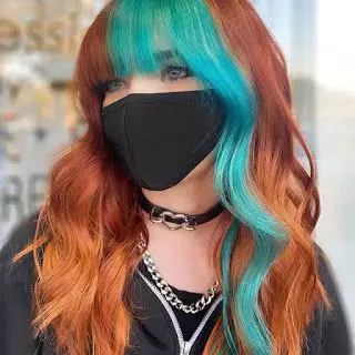33-unique-split-hair-dye-ideas-trending-color-combinations-to-try-in-2023 Auburn Hair With Aqua Money Piece