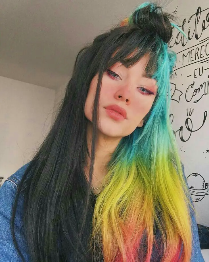 33-unique-split-hair-dye-ideas-trending-color-combinations-to-try-in-2023 Black & Faded Rainbow Split Hair