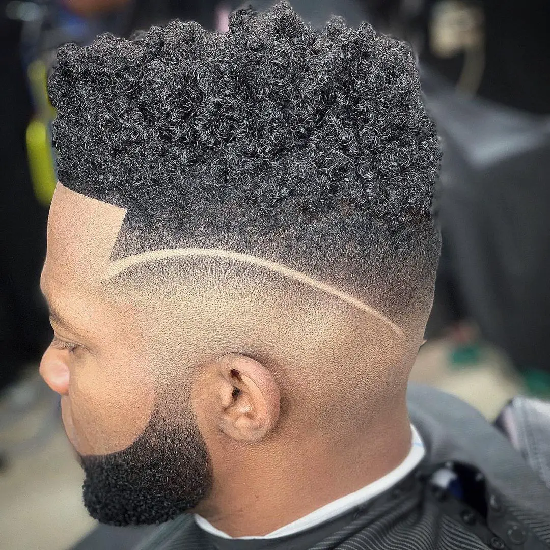 35-best-taper-fade-haircuts-for-black-men-high-and-038-low-fade-ideas Skin Fade with Tall Twists and Arched Parting