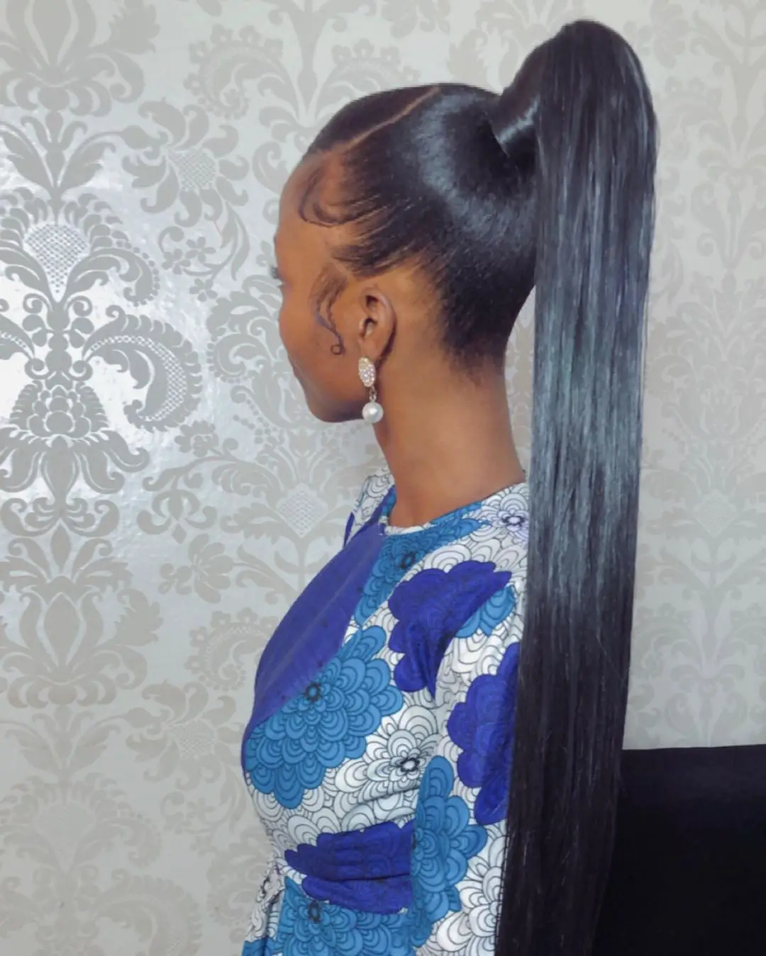 40-ponytail-hairstyles-for-black-women-braided-and-038-natural Long Sleek Ponytail with A Side Sweep Bang
