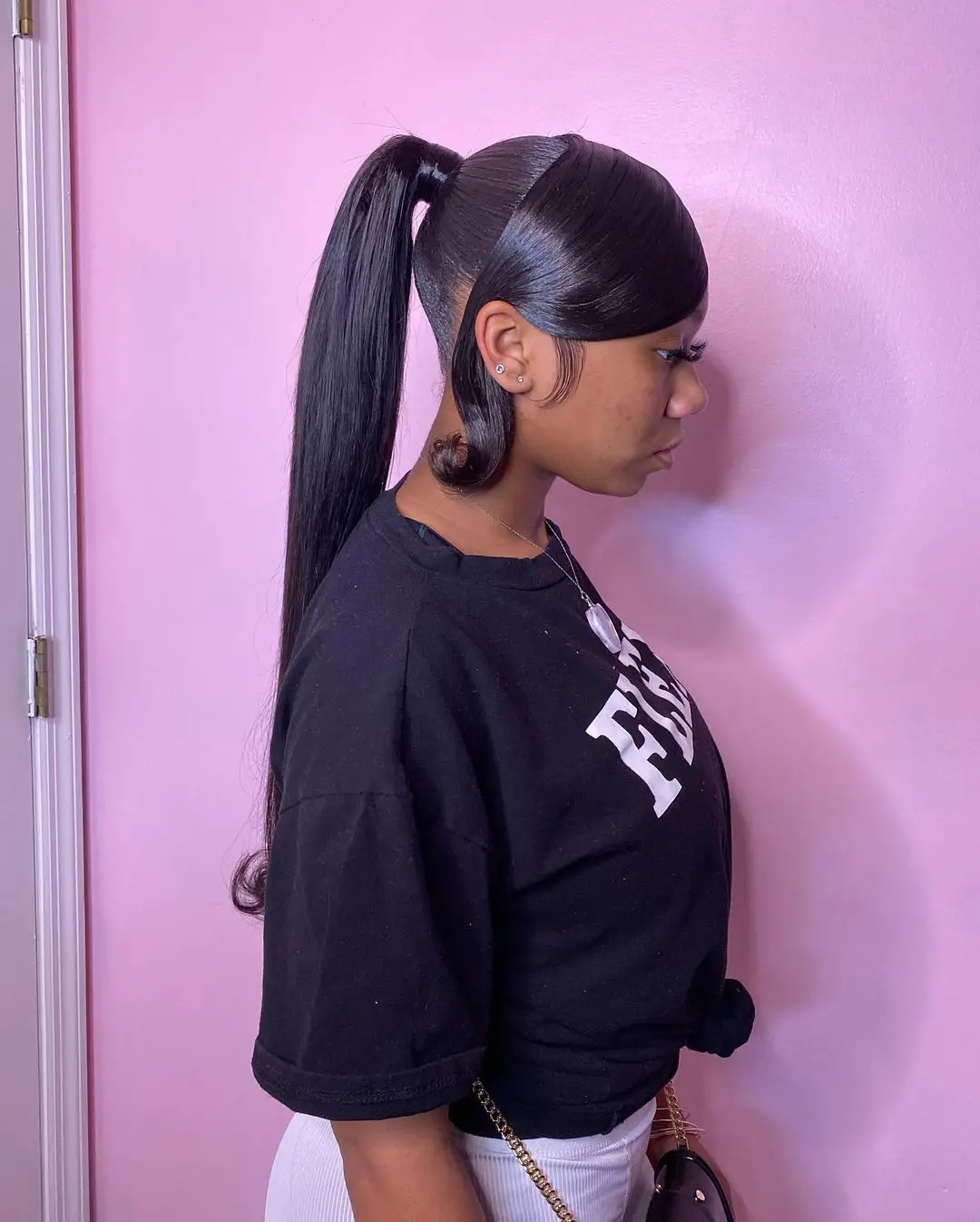 40-ponytail-hairstyles-for-black-women-braided-and-038-natural Long Sleek Ponytail with Thick Bang