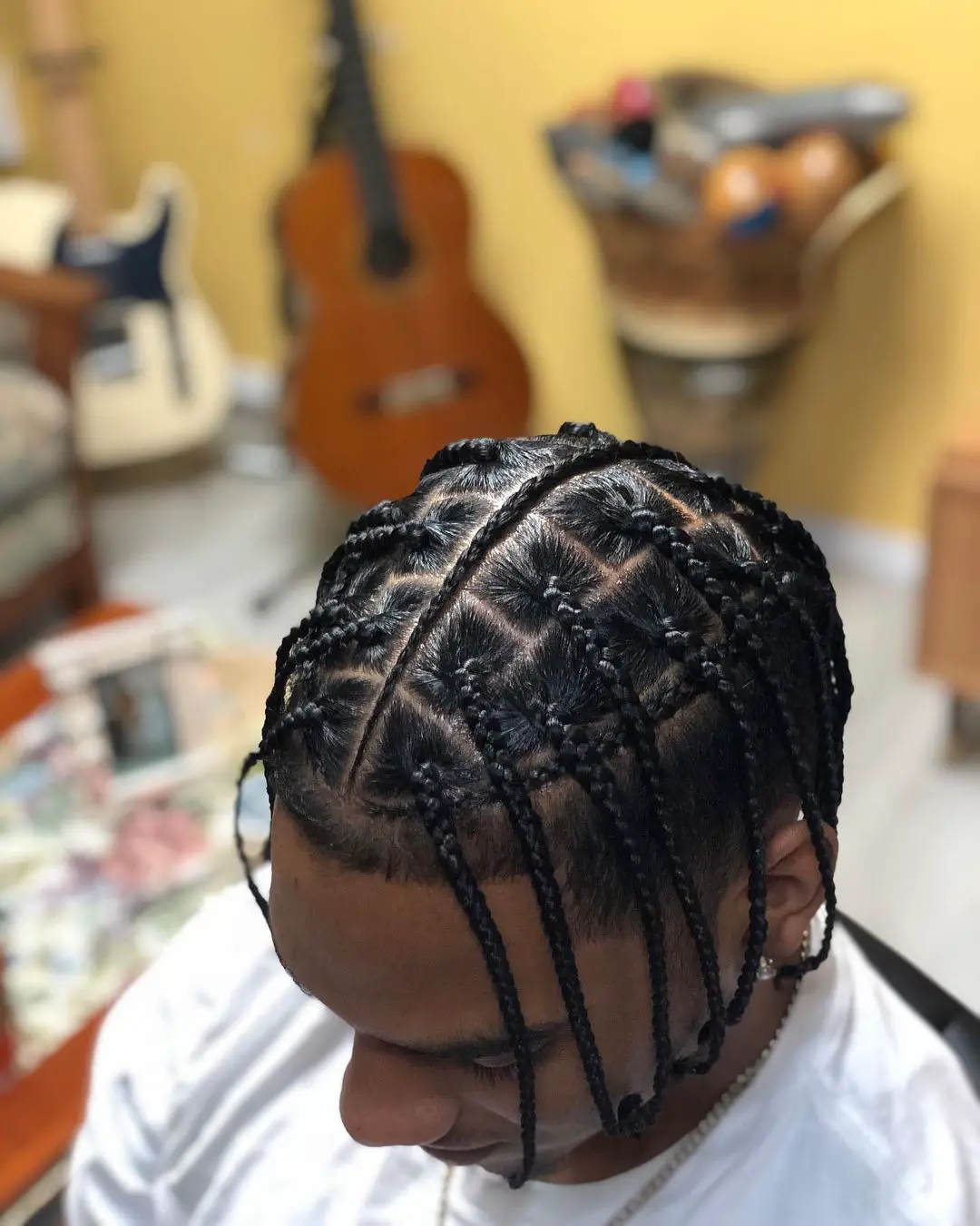 42-coolest-braid-hairstyles-for-black-men Box Braids with braid Parting and Undercut