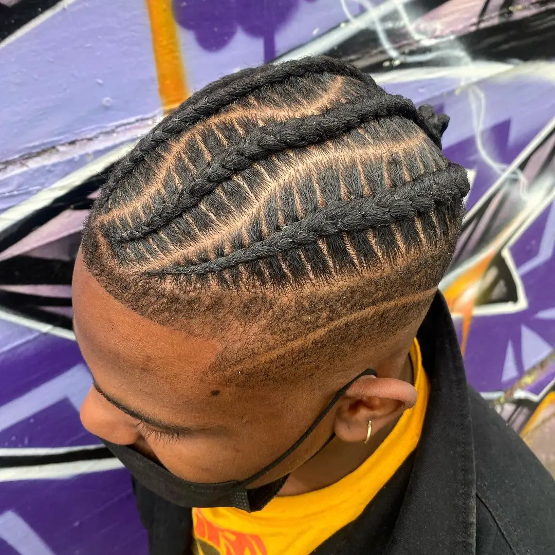 42-coolest-braid-hairstyles-for-black-men Fun Cornrows with Undercut