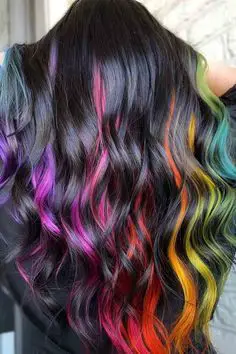 45-sexy-black-hair-ideas-trending-colors-to-try-in-2023 Peekaboo Rainbow Highlights