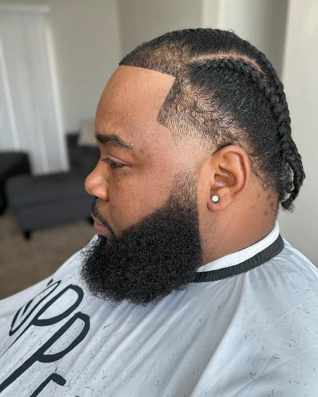 50-best-hairstyles-for-big-men Temple Fade with Cornrows