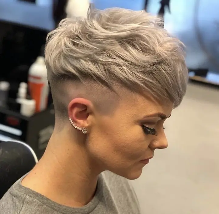 50-coolest-shaved-haircuts-for-women-short-back-and-038-sides Textured and Tousled Pixie with Skin Fade Undercut