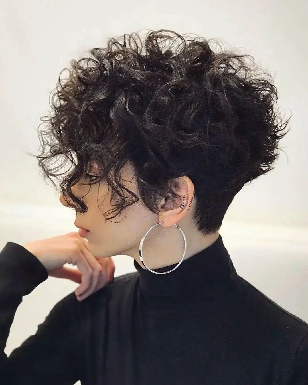 55-best-tapered-haircuts-and-fades-for-women Curly Pixie with Long Bangs