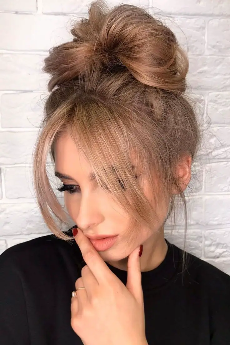 100-trendy-curtain-bangs-for-all-hair-types Messy Bun With Curtain Bangs