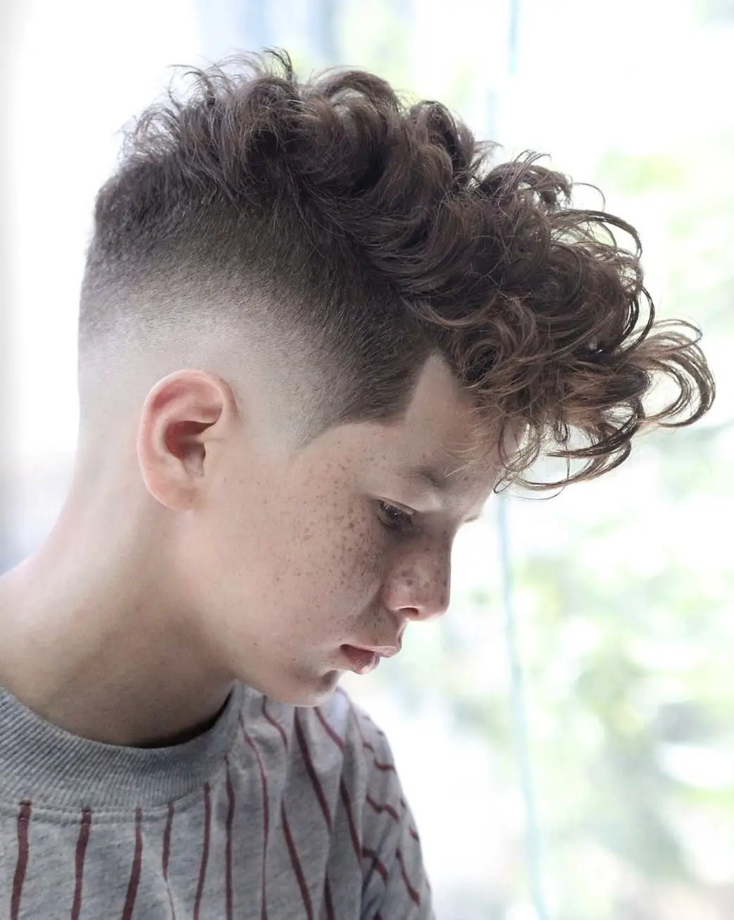100-trendy-school-haircuts-for-boys-whats-cool-this-year Curly Faux Hawk