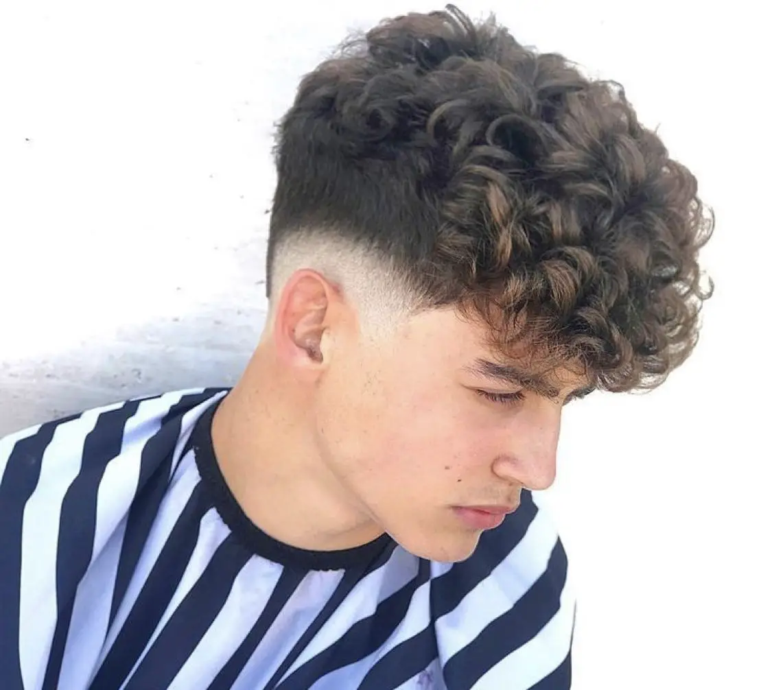 100-trendy-school-haircuts-for-boys-whats-cool-this-year Curly Pompadour